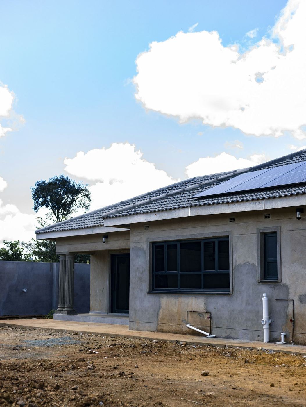 Solar panels fitted on a house under construction